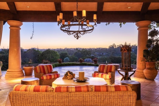 patio terrace at dusk with an outdoor living space