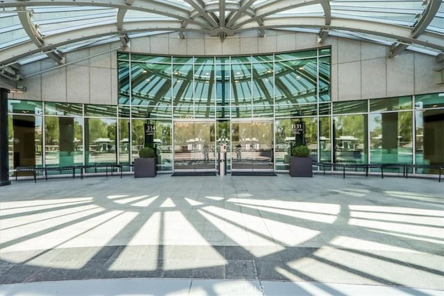 entrance to property featuring a patio area