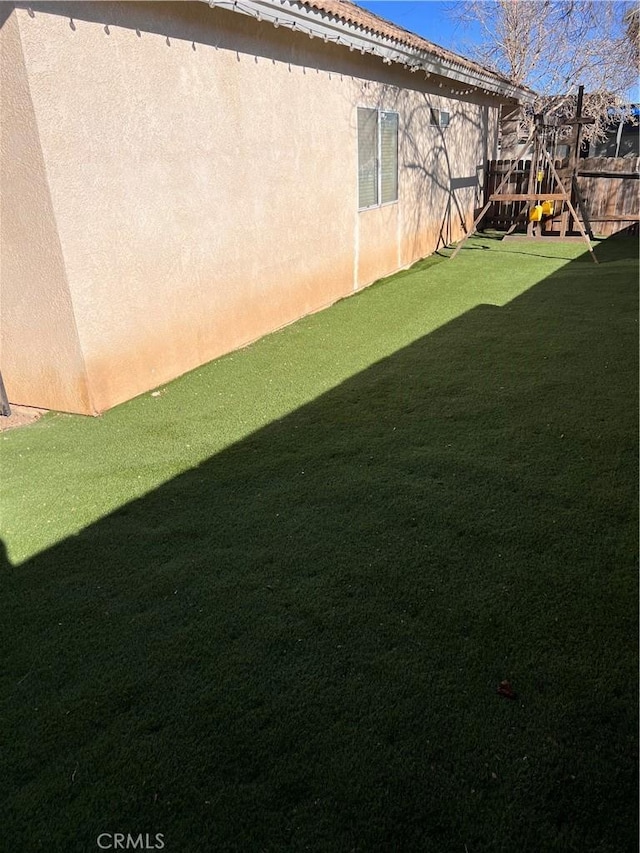 view of yard featuring a playground