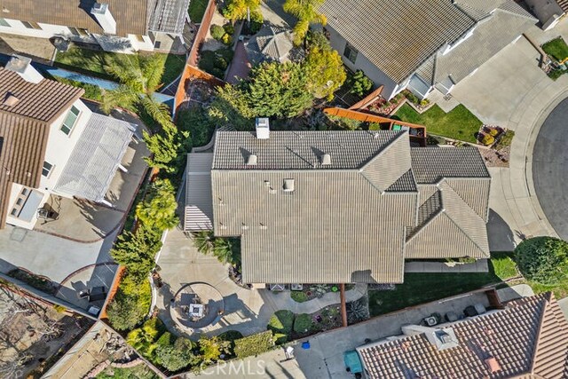 birds eye view of property with a residential view