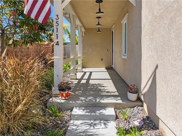 view of patio / terrace featuring fence