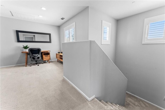 home office featuring recessed lighting, visible vents, baseboards, and carpet