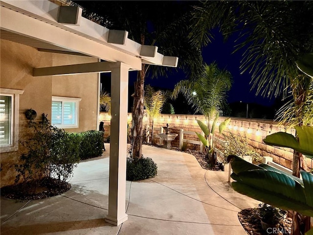 view of patio at night