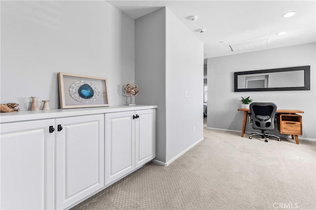 office space featuring visible vents, recessed lighting, light colored carpet, and baseboards