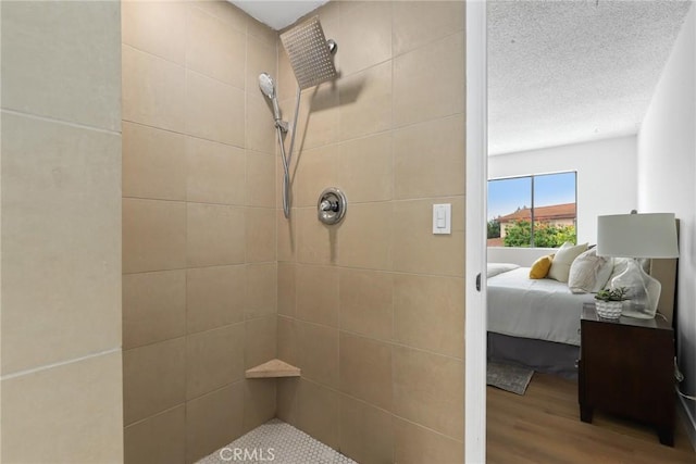 11328 Felson St, Cerritos, CA 90703 - full bathroom featuring tiled shower, wood finished floors, and ensuite bath