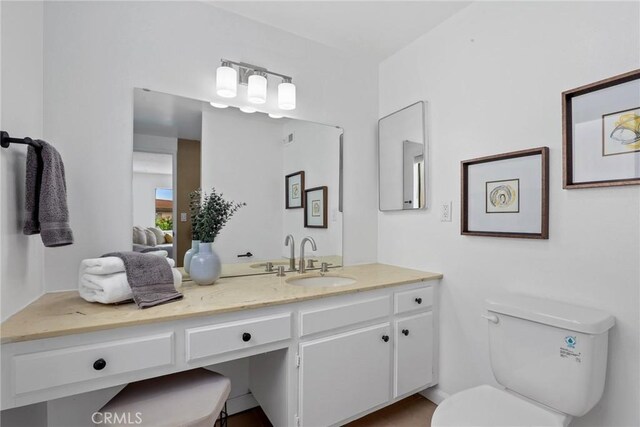 11328 Felson St, Cerritos, CA 90703 - bathroom with vanity and toilet