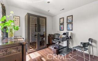 office area with wood finished floors and french doors