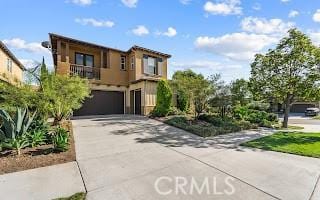 view of front of house with a garage and driveway