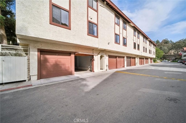 view of building exterior with a garage