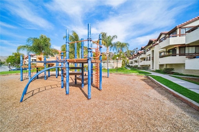 community playground featuring a residential view