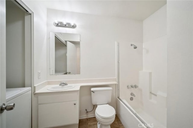 bathroom with shower / washtub combination, toilet, and vanity