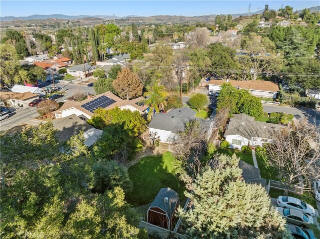 aerial view featuring a mountain view and a residential view