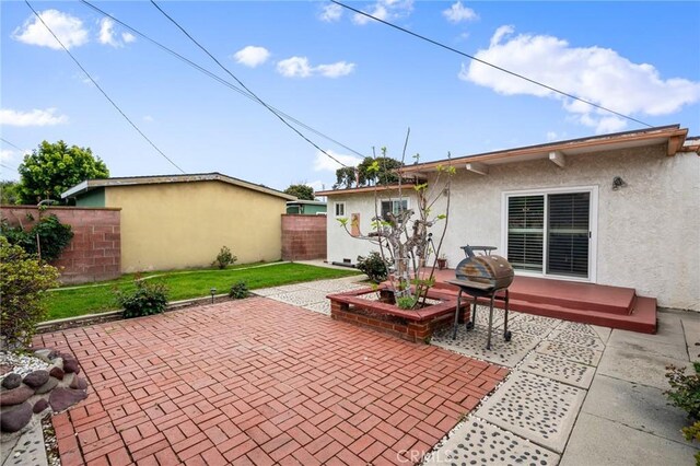 view of patio / terrace with fence