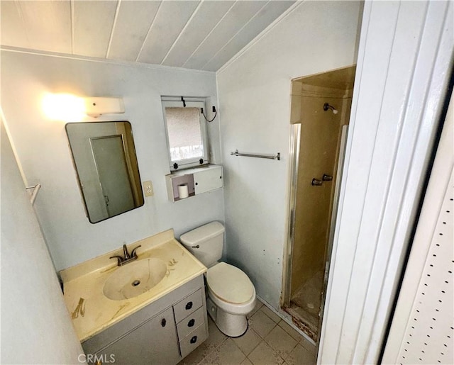 full bathroom featuring toilet, vaulted ceiling, a stall shower, tile patterned floors, and vanity