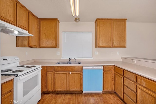 kitchen with dishwashing machine, light wood finished floors, white range with electric cooktop, a sink, and under cabinet range hood