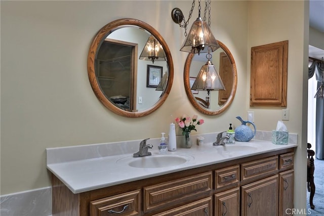 full bath with a sink and double vanity