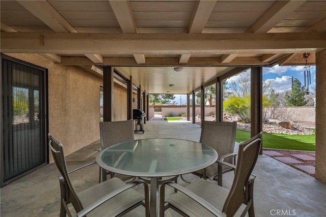 view of patio / terrace with area for grilling and outdoor dining area