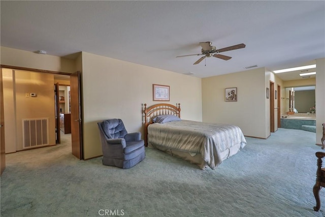 bedroom featuring visible vents, carpet flooring, and ceiling fan