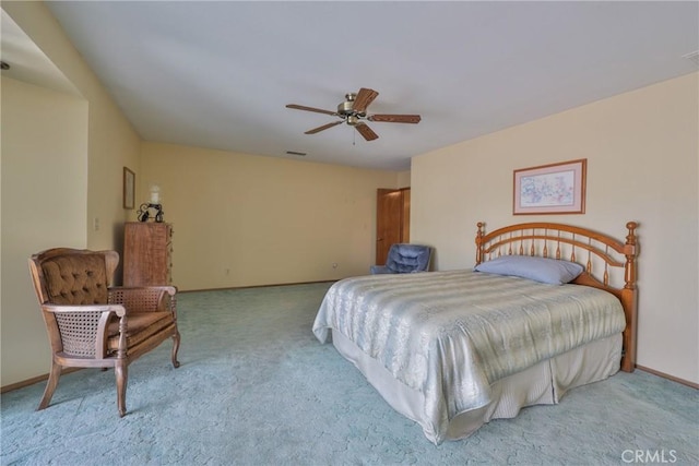 bedroom featuring carpet flooring, ceiling fan, baseboards, and visible vents