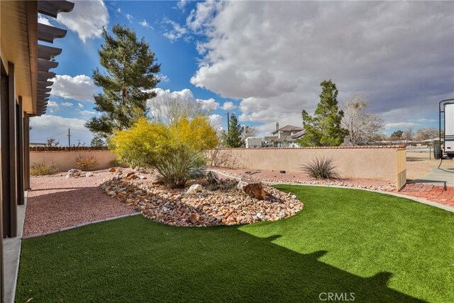 view of yard featuring fence