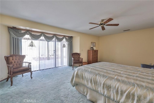 bedroom with visible vents, carpet, ceiling fan, and access to outside