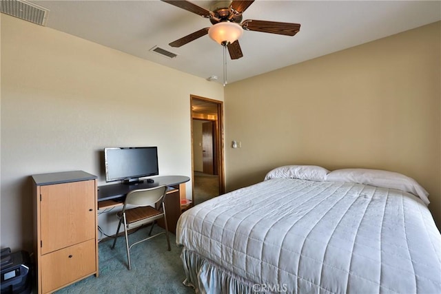 carpeted bedroom featuring visible vents and ceiling fan