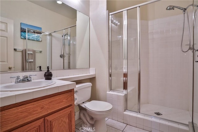 1412 San Clemente Cir, Corona, CA 92882 - full bath with vanity, tile patterned floors, a shower stall, and toilet
