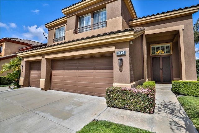 1412 San Clemente Cir, Corona, CA 92882 - view of front of property featuring a tiled roof, stucco siding, and a garage