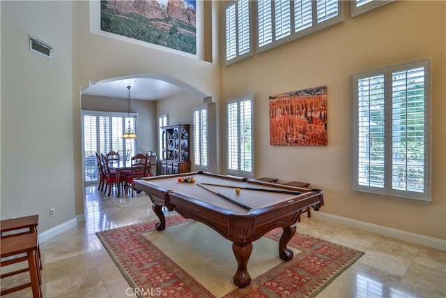 1412 San Clemente Cir, Corona, CA 92882 - playroom featuring a healthy amount of sunlight and arched walkways
