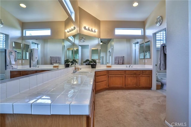 1412 San Clemente Cir, Corona, CA 92882 - bathroom featuring a healthy amount of sunlight, vanity, recessed lighting, and toilet