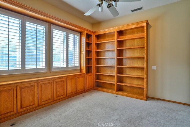 1412 San Clemente Cir, Corona, CA 92882 - unfurnished room with a wealth of natural light, a ceiling fan, light colored carpet, and visible vents