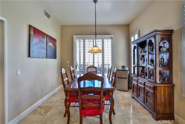 1412 San Clemente Cir, Corona, CA 92882 - dining room featuring baseboards, visible vents, and light tile patterned floors