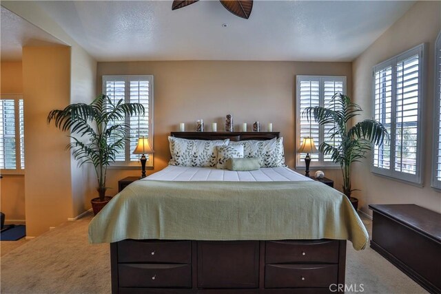 1412 San Clemente Cir, Corona, CA 92882 - carpeted bedroom with baseboards and multiple windows