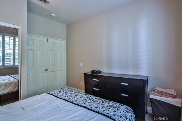 1412 San Clemente Cir, Corona, CA 92882 - bedroom featuring baseboards, visible vents, and a closet