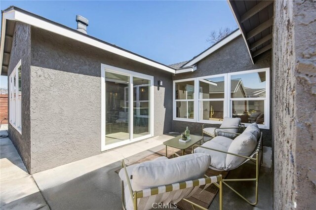 view of patio with an outdoor living space