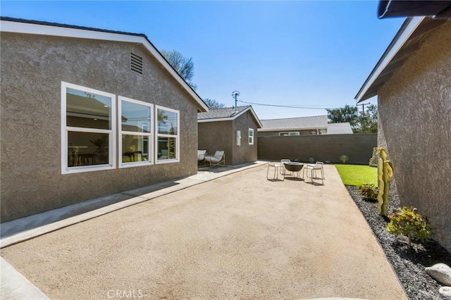 view of patio / terrace with fence