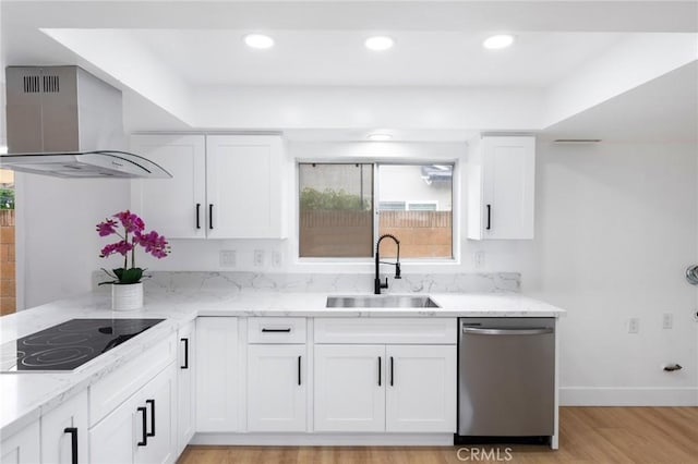 kitchen featuring black electric stovetop, light stone countertops, wall chimney range hood, dishwasher, and a sink