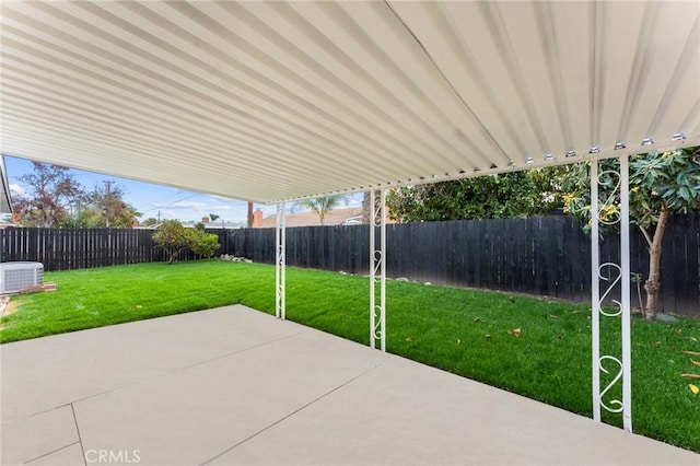 view of patio featuring central air condition unit and a fenced backyard