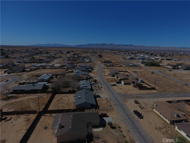 bird's eye view featuring a mountain view and a residential view