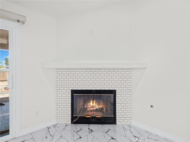 14606 Orange St, Hesperia, CA 92345 - interior details featuring baseboards and a brick fireplace