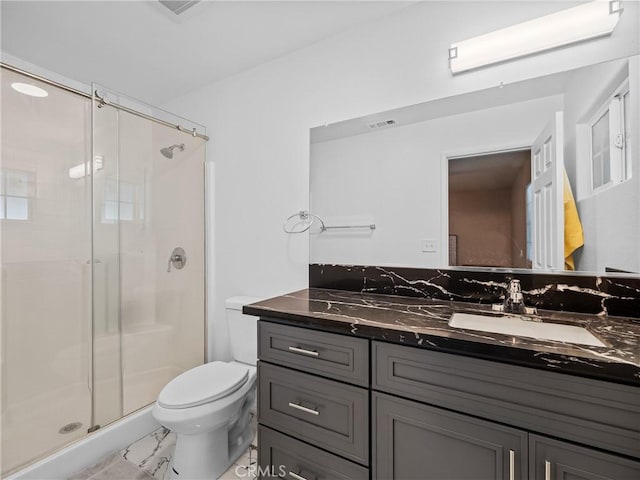 14606 Orange St, Hesperia, CA 92345 - full bath featuring vanity, visible vents, toilet, marble finish floor, and a stall shower