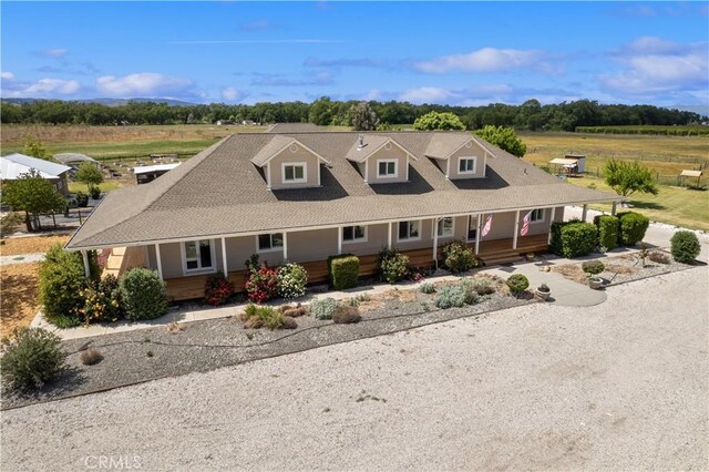 view of front of home featuring covered porch and driveway