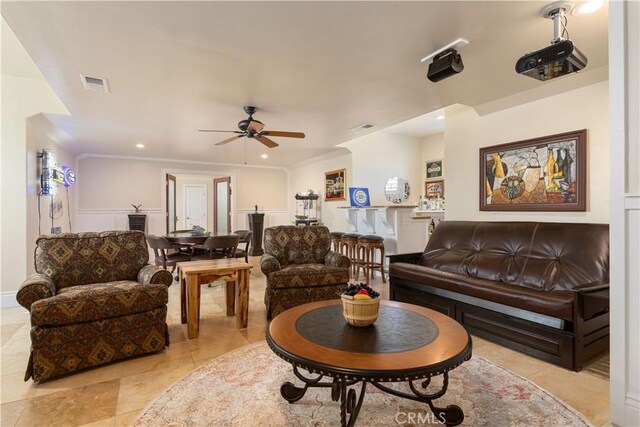 living room featuring visible vents, recessed lighting, crown molding, and ceiling fan