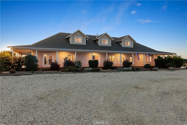 farmhouse inspired home with covered porch