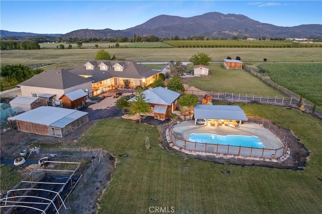 drone / aerial view with a rural view and a mountain view