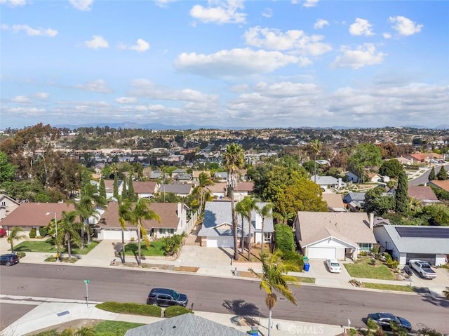 birds eye view of property with a residential view