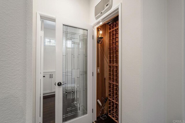 wine room featuring a textured wall