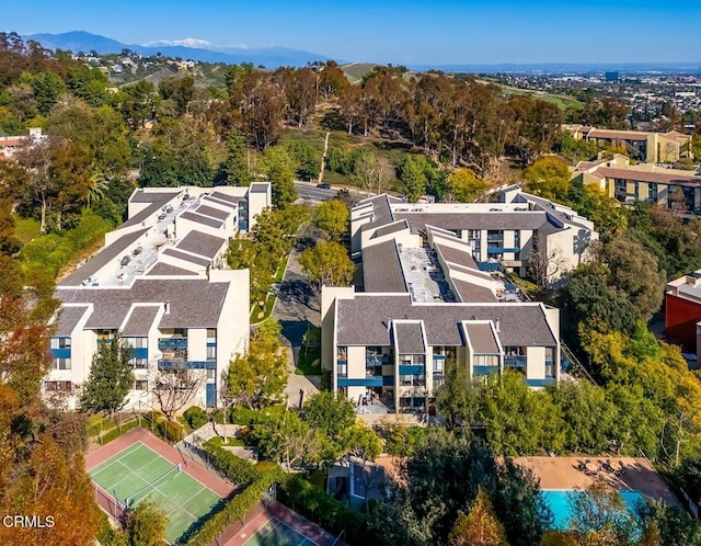 birds eye view of property with a residential view