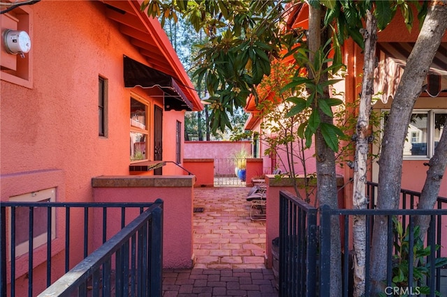 view of patio featuring fence