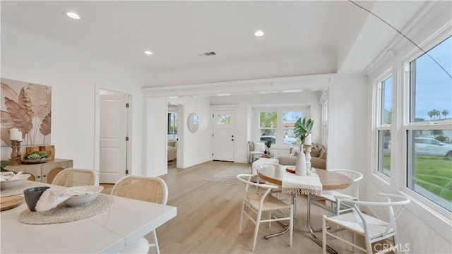 dining room featuring recessed lighting, visible vents, and light wood finished floors